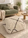 Diyara Artisanat Pouf en laine et coton écru à lignes noires 2.webp