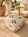 Diyara Artisanat Pouf en laine et coton écru à motifs noirs 11.webp