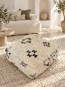 Diyara Artisanat Pouf en laine et coton écru à motifs noirs 8.webp